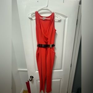 Coral jumpsuit with gold belt